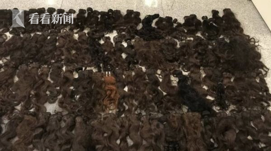 海關查獲“瘆人”紙箱 內裝370束人體毛發(fā)