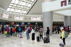 商品編碼查詢-氣溫攀升 客流回暖 ?？诿捞m國際機場戰(zhàn)“疫”復(fù)工兩手抓（附圖